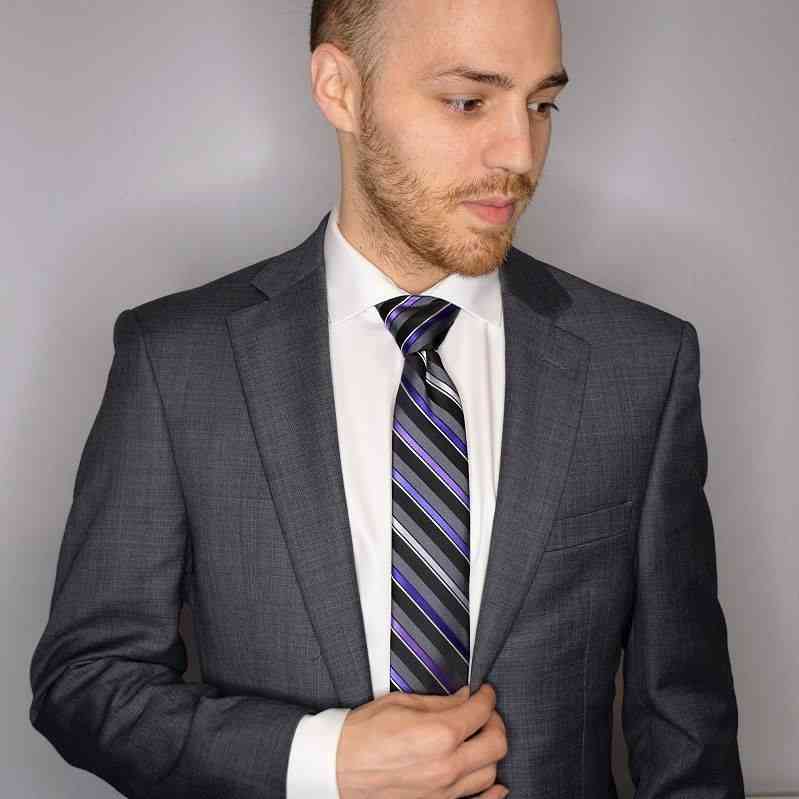 Destin Lewis in a suit and tie